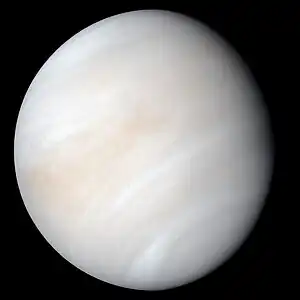 Venus in approximately true colour, a nearly uniform pale cream, although the image has been processed to bring out details.Lakdawalla, Emily (21 September 2009), Venus Looks More Boring than You Think It Does (页面存档备份,存于), Planetary Society Blog (retrieved 4 December 2011) The planet's disc is about three-quarters illuminated. Almost no variation or detail can be seen in the clouds.