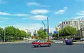 一辆“法兰红”出租车在新建路和东大名路间行驶
